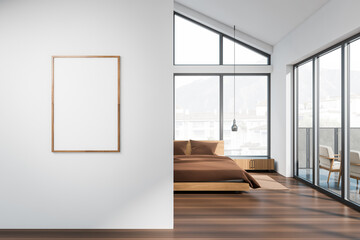 Light bedroom interior with bed near panoramic window. Mockup poster