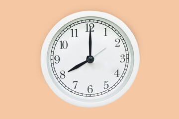 Classic white wall clock 8.00 a.m.