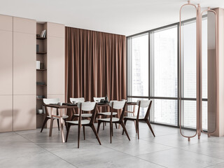 Corner view on bright dining room interior with table, chairs