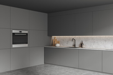 Grey kitchen set interior with sink, kitchenware and corner with oven