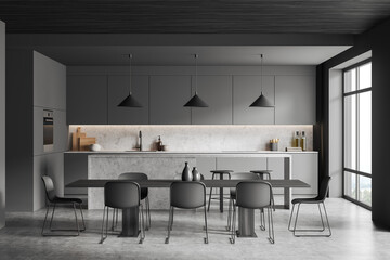 Grey kitchen set interior with eating table and seats, countertop and window
