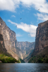 The Sump Canyon is the most spectacular part of the Sumidero Canyon where the waters of Grijalva River are deepest and the canyon walls reach up to 1,000 meters high -located in Chiapas -South Mexico.