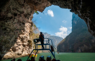 Sunlight bursts through the Sumidero Canyon in Chiapas State in southern Mexico. A boat tour here is one of the most popular touristic attractions in southern Mexico.