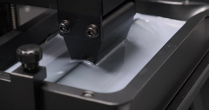 MSLA 3D printer, consumer resin 3d printer build plate moving up and down in resin vat. 3D printer.