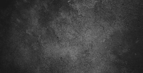 Black dark grunge background and texture of black concrete wall.