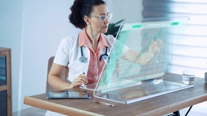 Medical female doctor scientist working at digital futuristic computer. Transparent display with 3D Hologram DNA data. - Powered by Adobe
