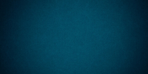 Dark blue background texture with black vignette in old vintage grunge textured border design, dark elegant teal color wall with light
