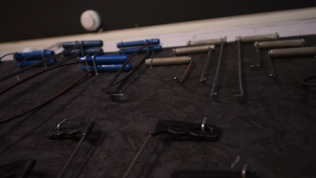 a beautifully laid out tool for carrying out car body repair in a car service station, restoration of defective and broken cars by a master, repair garage, auto tuning place