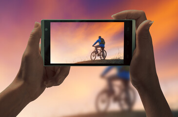 Cyclist on a smartphone
