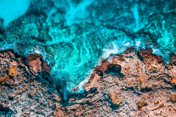 Drone top down photo of coastal shore 