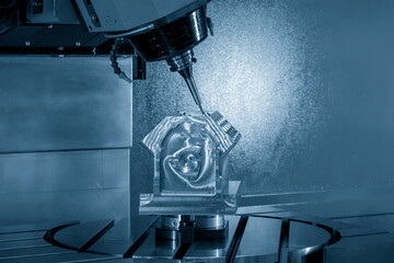 The 5-axis  machining center cutting the aluminum V8 engine  block parts with solid ball endmill...
