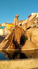 A woman of the seas stone sculpture