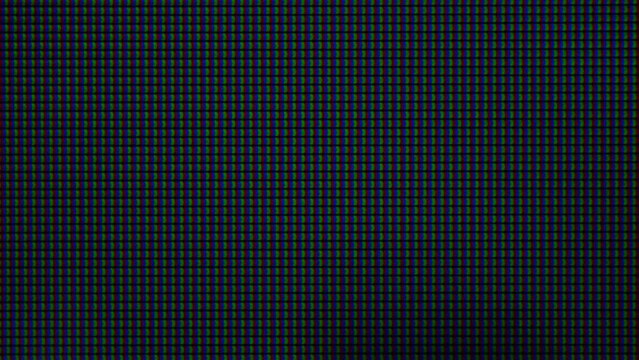 Extreme macro view of LED matrix, monitor or TV screen, broadcasting view.