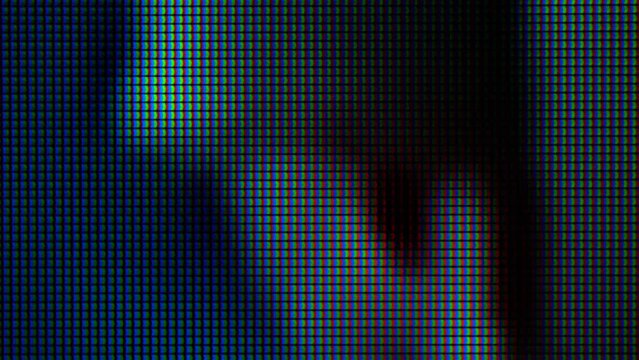 Extreme macro view of LED matrix, monitor or TV screen, broadcasting view. Background for video wall, DJing, VJing.