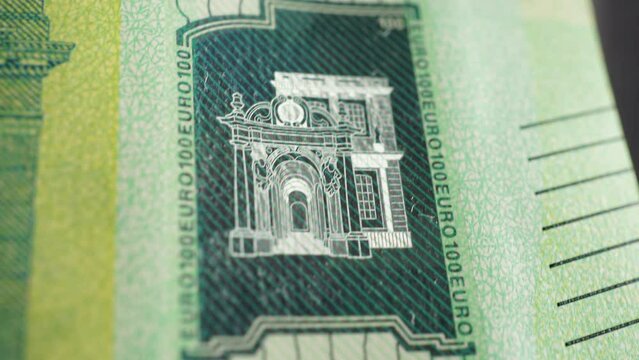 Paper money, euro, fiat money. Stop motion, macro view of parts of banknotes as a financial background. Light zoom. Financial and business success as a concept. Currency cash animation.