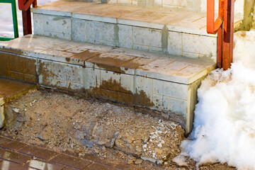 a broken step. the concept of objects destroyed by water in spring.