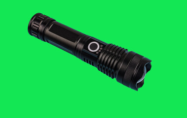 modern black metal flashlight isolated on white