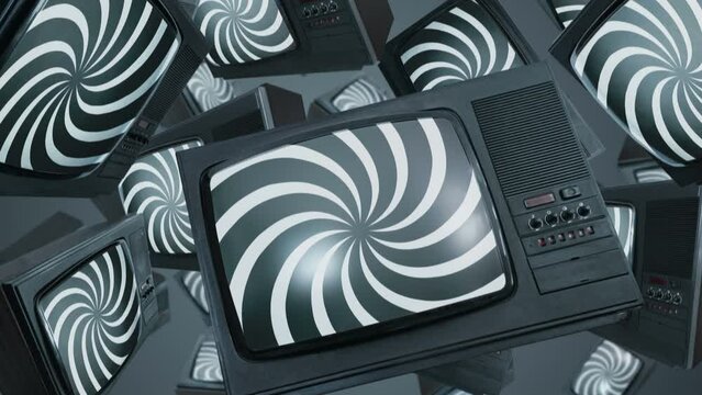 Many vintage TV with hypnotic spiral on screens.