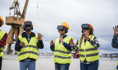 Multiracial workers using virtual reality headsets at Freight Terminal Port - Focus on african woman hands