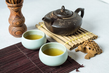 Tea set, on a wooden table made of bamboo