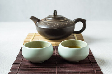 Tea set, on a wooden table made of bamboo