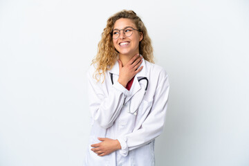 Fototapeta premium Young doctor blonde woman isolated on white background looking up while smiling