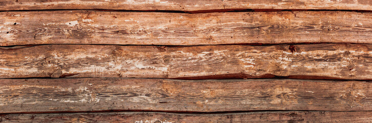 Naturalne tło niejednolitych starych grubych drewnianych desek z teksturą korozji drewna.. Kolory brązu. Tapeta. - obrazy, fototapety, plakaty