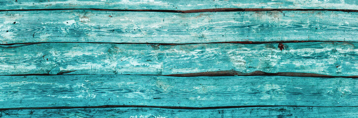 Naturalne tło niejednolitych starych grubych drewnianych desek z teksturą korozji drewna.. Kolory niebieskie. Tapeta.