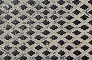 Metallic surface with beach sand