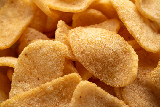 Crispy Prawn Crackers in white bowl on wooden table