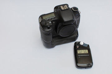 light meter and camera device on a white background