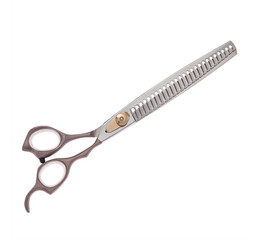 Scissors for cutting people and pets. Grooming scissors. Closed scissors on a white isolated background. Side view.