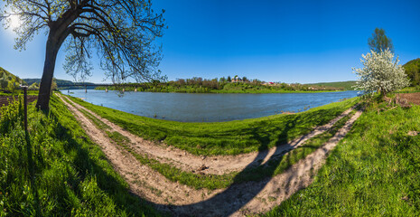 Naklejka premium Amazing spring view on the Dnister River Canyon. View from Nezvysko village blossoming river coast,.Ivano-Frankivsk region, Ukraine