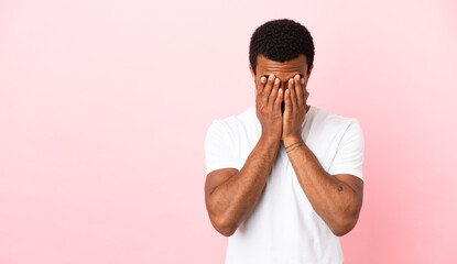 African American man on copyspace pink background with tired and sick expression