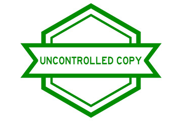 Vintage hexagon label banner with word uncontrolled copy in green color on white background