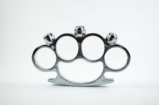 Silver Knuckle Weapon On The Isolated White Background