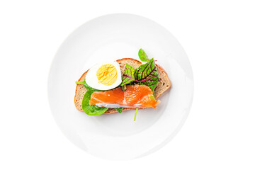 smorrebrod salmon sandwich egg green leaves salad mix, bread toast seafood open sandwich fresh meal food snack on the table copy space food background 