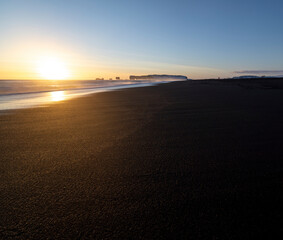 Sunset over the black sand beach in iceland