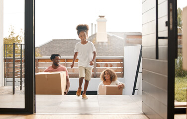 The home is the chief school of human virtues. Shot of a family carrying boxes into their new home.
