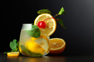 Frozen glass with a cocktail on a black background.
