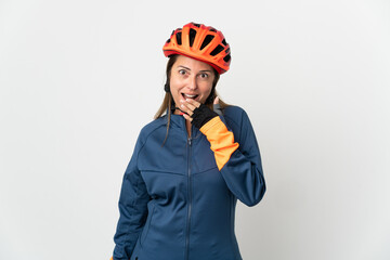 Middle age cyclist woman isolated on white background happy and smiling covering mouth with hand