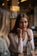 Telling her something important