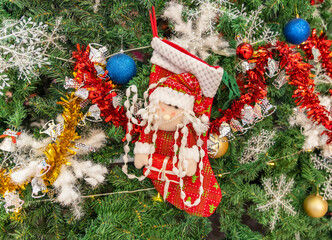 christmas tree ornaments on tree