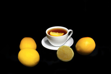 Obraz na płótnie Canvas Tea, lemon, yellow, hot vitamin drink 