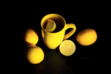 Obraz na płótnie Canvas Tea, lemon, yellow, hot vitamin drink 
