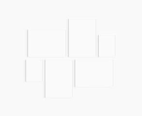 Gallery wall mockup. Set of 6 white frames. Gallery wall frame mockup. Two 50x70 (5:7), two 70x50 (7:5), and two 30x40 (3:4) white frames.