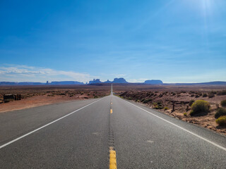 Fototapeta na wymiar Straight road to Monument Valley Arizona