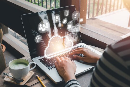 Woman hand using laptop computer with cloud computing icon, Cloud computing concept, Backup Storage Data Internet, networking and digital, Share global, technology concept.
