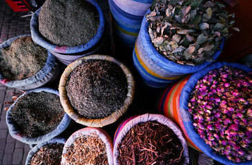 Exotic colorful spices and herbals on moroccan street market.
