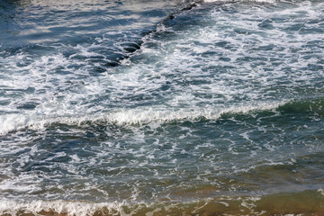 waves on the beach in portugal
